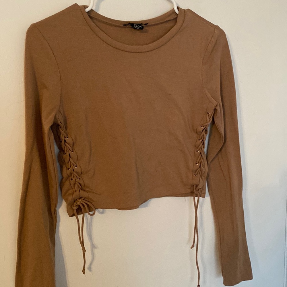 Crop top . With ties on the side